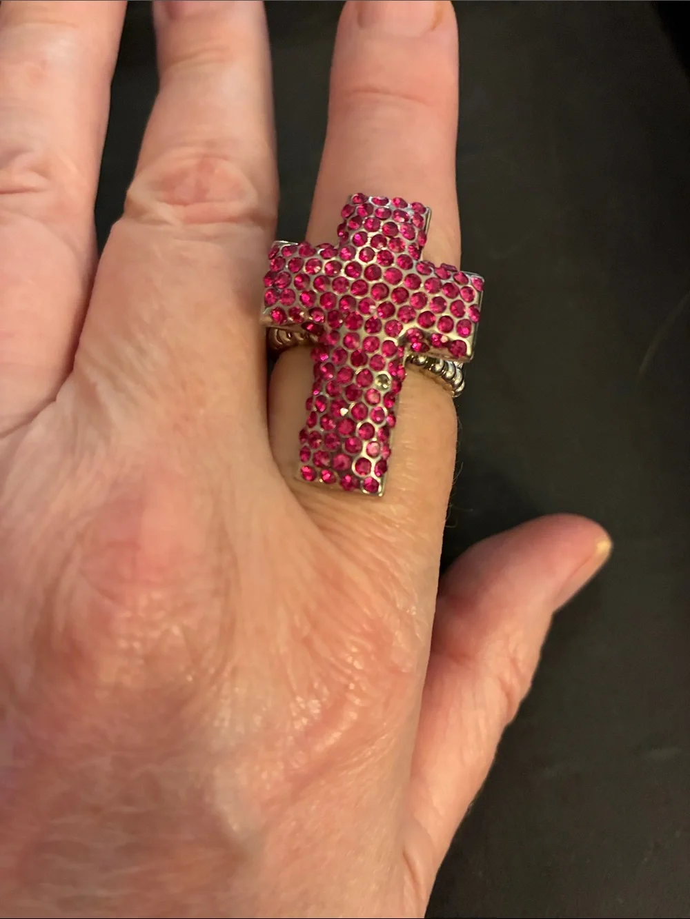 Pink Cross Statement Stretch Ring. Pink crystals encrust this cross ring. NWT